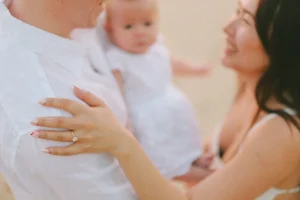 A family with a baby at the beach