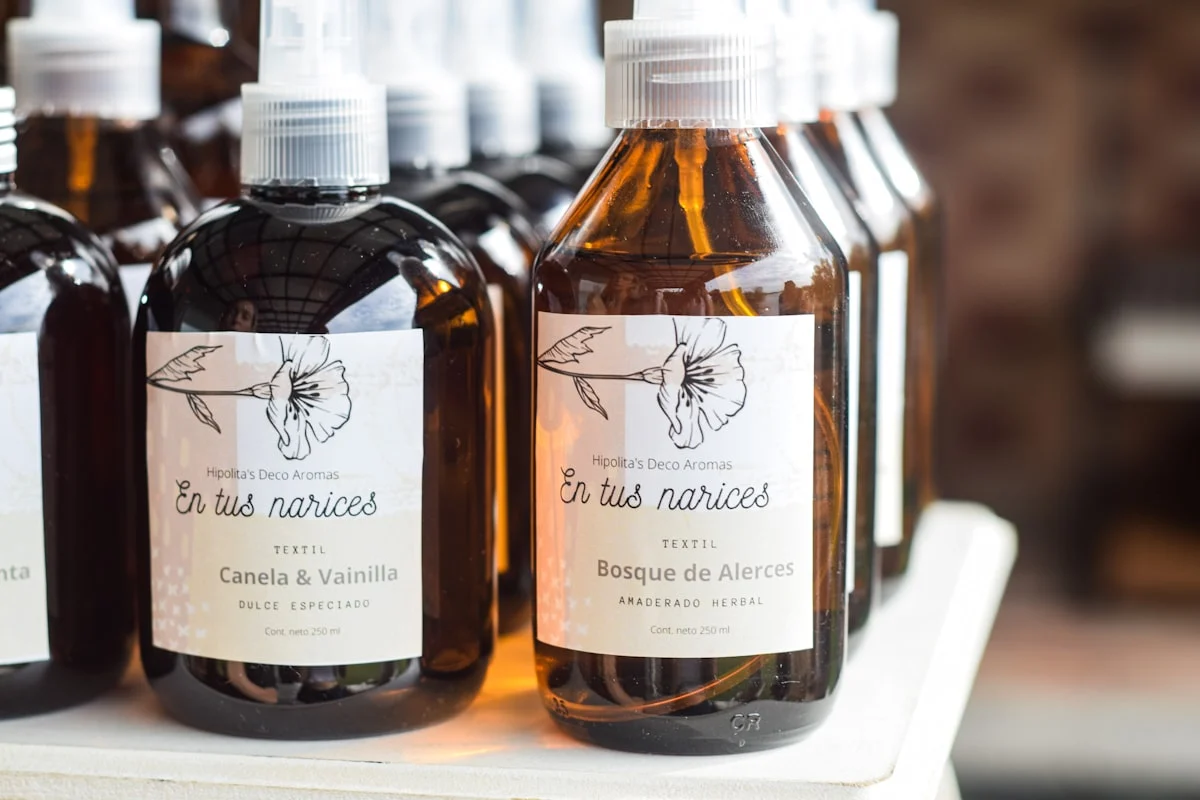 a table topped with lots of bottles of liquid